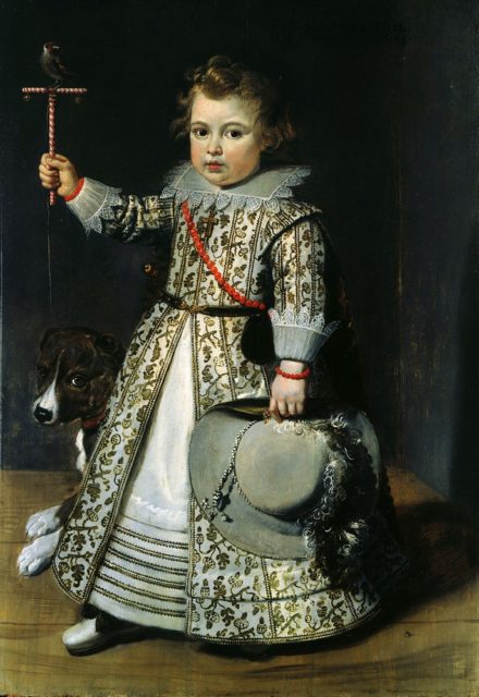 Flemish boy of 1625 in a dress with sewn in tucks to both layers of the skirt to allow for growth. Source: Wikipedia/Public Domain
