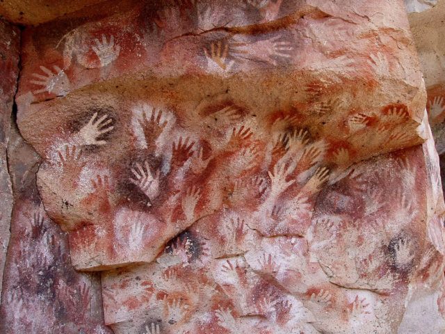 Hands prints at the Cuevas de las Manos. Photo Credit