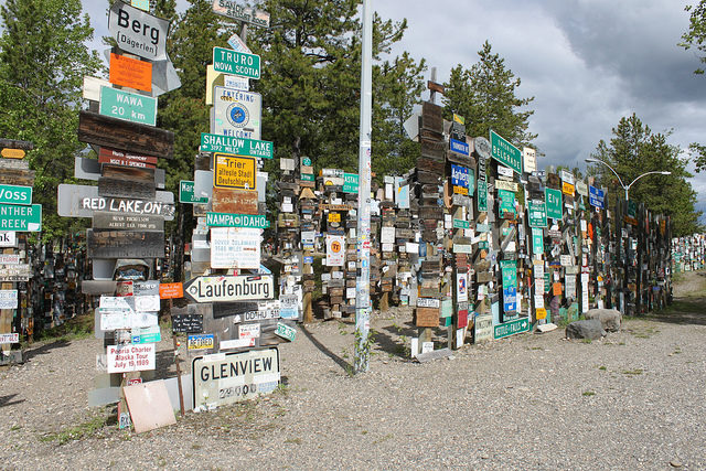 Visitors may add their own signs to the 100,000 already present. By Eli Duke Flickr CC BY-SA 2.0