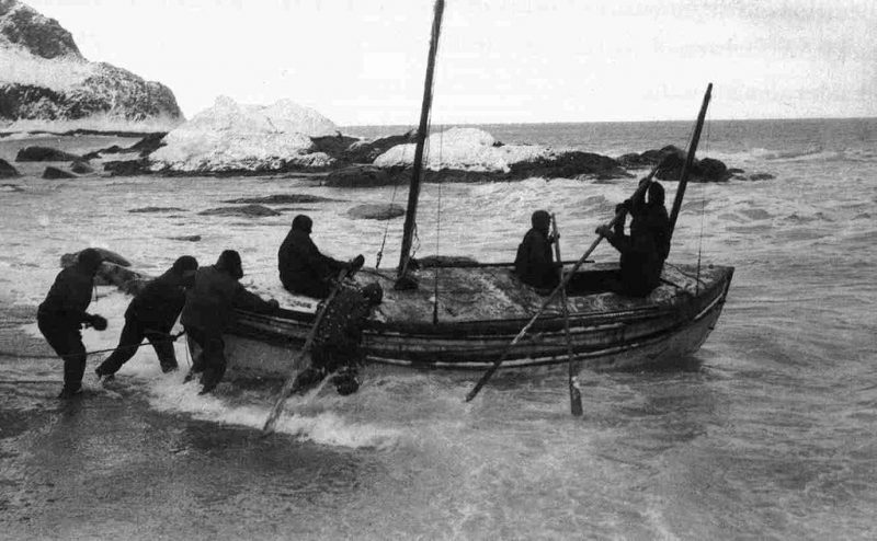Launching the James Caird from the shore of Elephant Island, 24 April 1916.