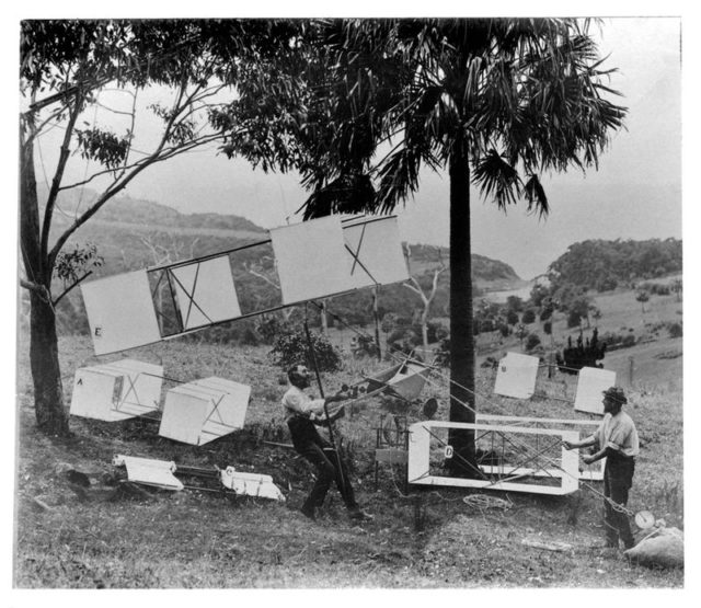 Lawrence Hargrave (seated) with his man-lifting kites in Stanwell Park, 1894