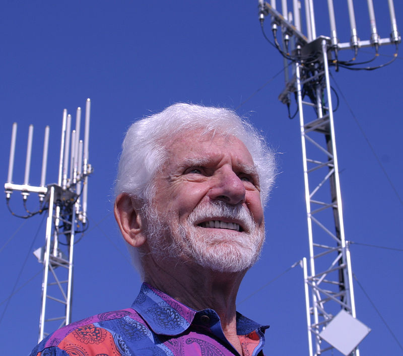 Picture of Martin Cooper standing in front of Two Antennas, dated October 2007. Photo Credit