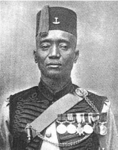 Alhaji Grunshi of the Gold Coast Regiment, 1918. He was the first soldier in British service to fire a shot in World War I