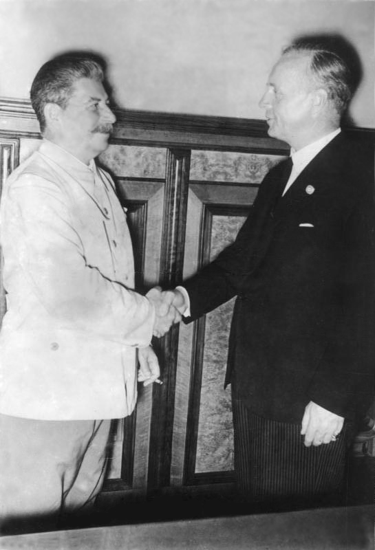 Stalin and Ribbentrop after the signature of the pact. August 23, 1939. Photo Credit