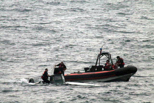 A narco-submarine being seized by the U.S. Coast Guard off the Coast of Guatemala on September 17, 2008.
