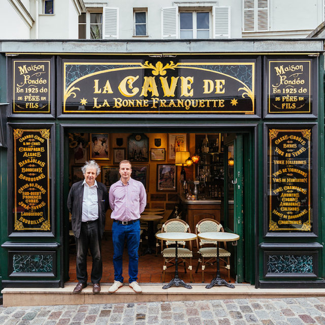 Luc Fracheboud and his father Patrick at the front door of their historic restaurant