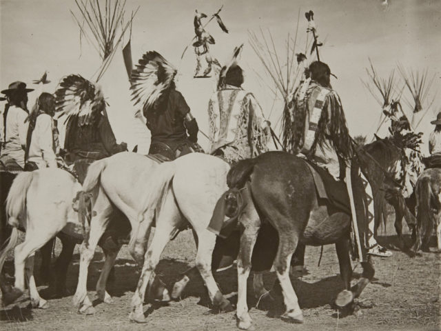 Native americans riding
