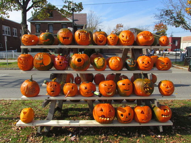 An assortment of carved pumpkins. Photo credit
