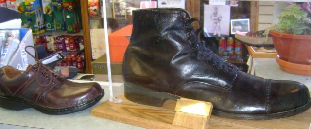 Wadlow's shoe compared to a size 12.Photo Credit