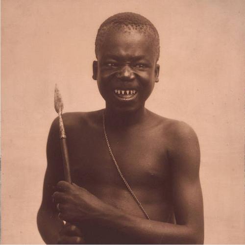 Ota Benga, Pygmy. Gerhard Sisters Collection. 1904. Missouri Historical Society. Part of the Louisiana Purchase Exposition in 1904. He was also a feature at the Bronx Zoo. Photo Credit