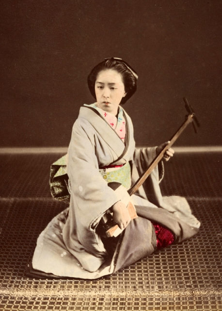 Tokyo geisha with shamisen, circa 1870s