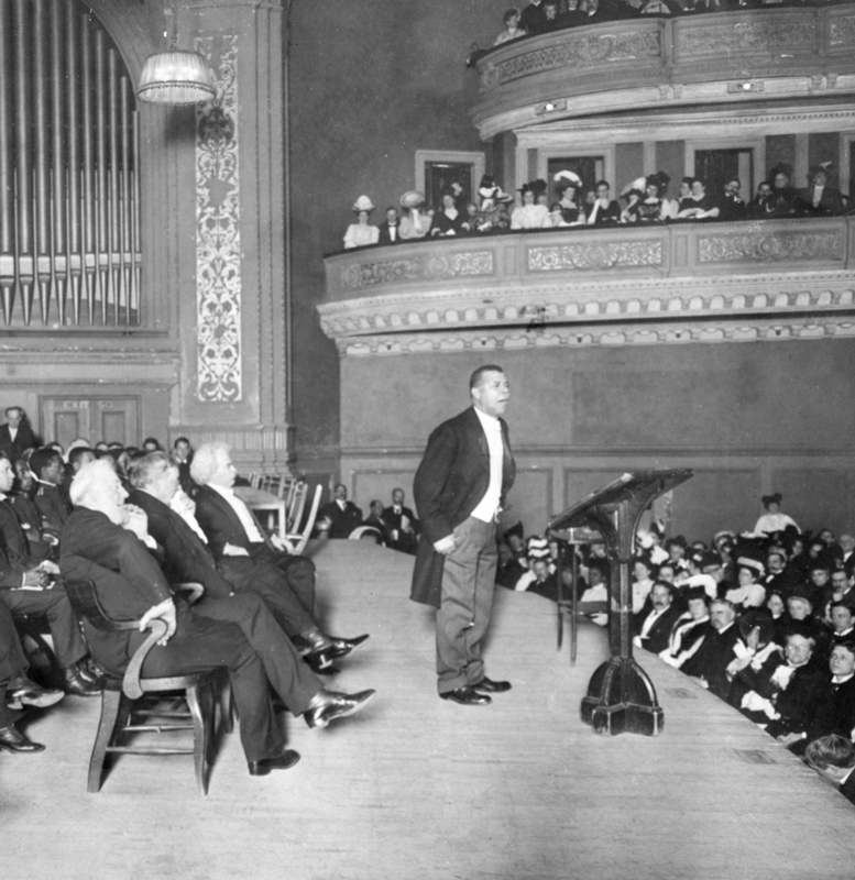 Washington giving a speech at Carnegie Hall in New York City, 1909