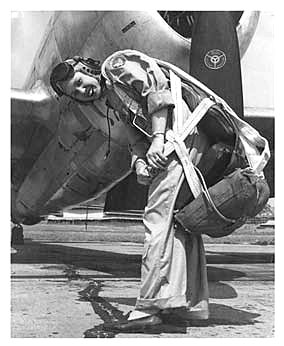 Deanie Parish in front of P-47 Thunderbolt on the flight line at Tyndall Air Force Base, Florida, in 1944