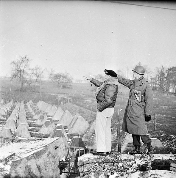 Field Marshal Montgomery with Major General Simpson looking at the 'Dragon's Teeth' part of the Siegfried Line. Photo Credit