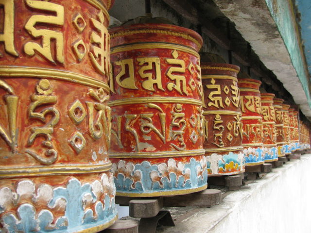 Prayer Wheels in the Monastery. Photo Credit