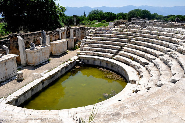 The white marble theater built into the side of the acropolis is in excellent conditionPhoto Credit
