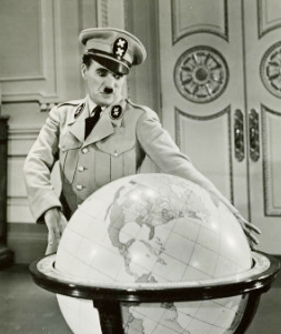 Chaplin satirising Adolf Hitler in The Great Dictator (1940)
