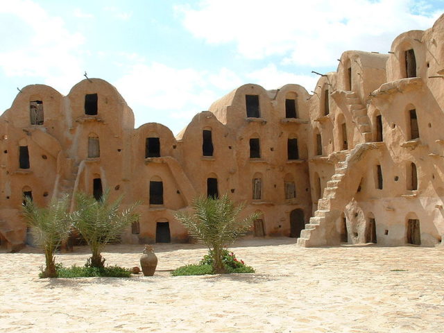 These stacked grain-holding buildings have survived the hot climate since the 15th century. Photo Credit