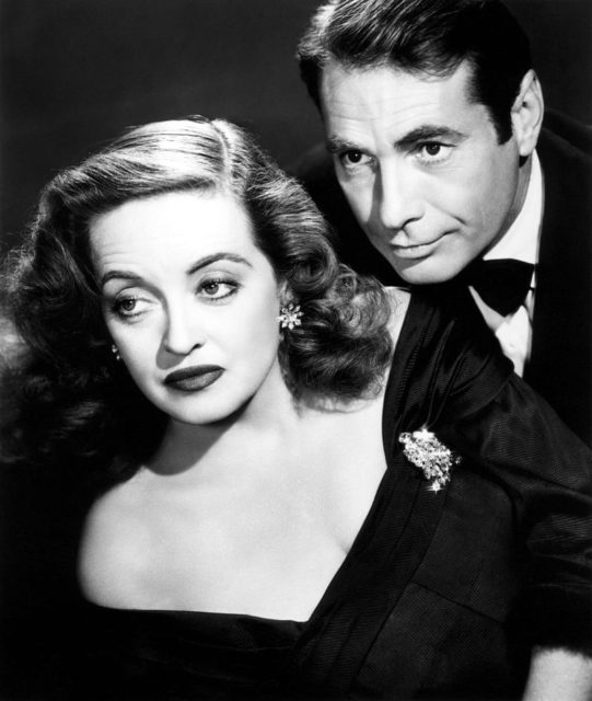 Davis posing as Margo Channing in a promotional image for All About Eve (1950). She is pictured with Gary Merrill, to whom she was married from 1950 to 1960 (her fourth and final husband) Photo Credit