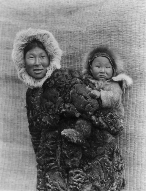 Nunivak Cup’ig mother and child, photograph by Edward Curtis, 1930 Photo Credit