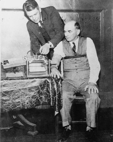 American inventor Leonarde Keeler (1903–1949) testing his improved lie-detector on Dr. Kohler, a former witness for the prosecution at the 1935 trial of Bruno Hauptmann