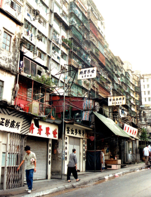 Numerous dental clinics at an edge of the Walled City in 1991. Photo Credit