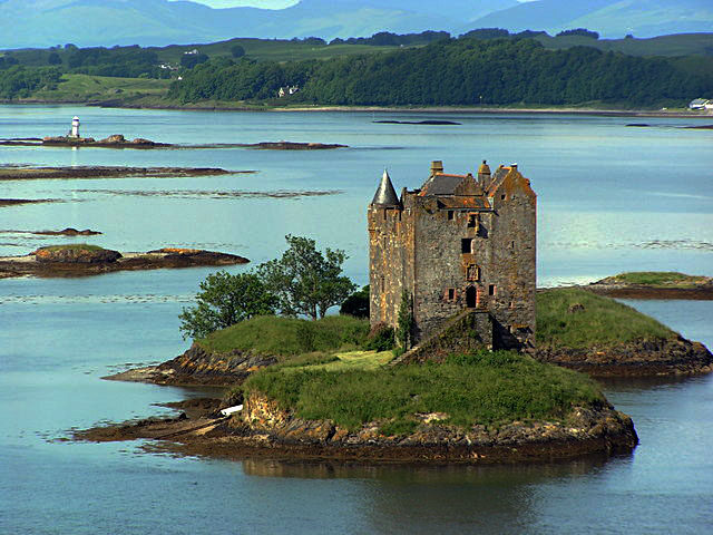 Castle Stalker with the Lynn of Lorne and Lismore beyond Photo Credit
