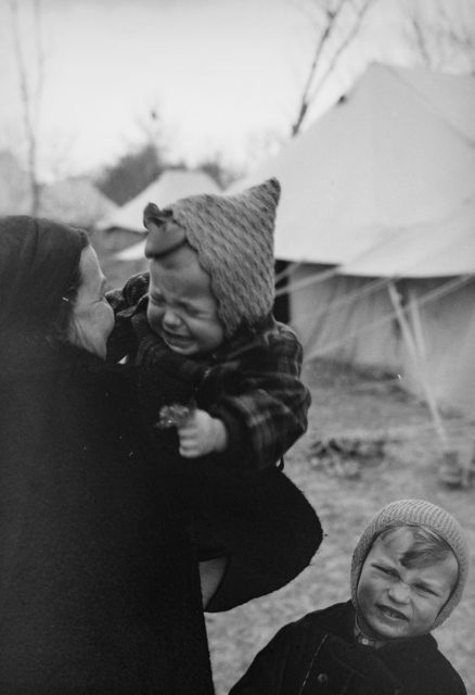 A-Polish-woman-holds-her-baby-girl-at-an-evacuee-camp-in-Tehran. Photo Credit