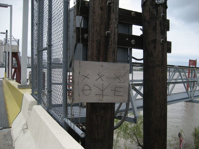 Hobo code at a Canal Street Ferry entrance in New Orleans, Louisiana Photo Credit