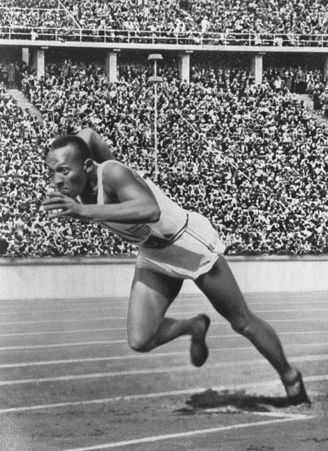 Jesse Owens at start of record breaking 200 meter race during the Olympic games 1936 in Berlin