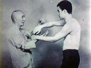 Lee and his teacher Yip Man.