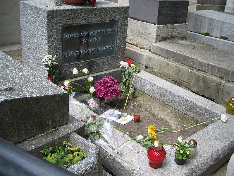 Jim Morrison’s grave at the Père Lachaise Cemetery in Paris. Photo Credit