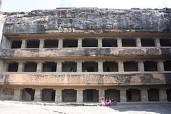 Cave no. 11 (above) and 12 are three story monasteries cut out of a rock, with Vajrayana iconography inside Photo Credit