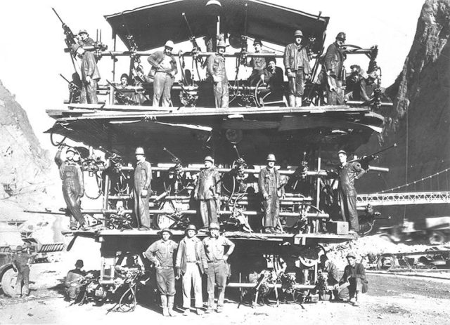 Workers on a “Jumbo Rig”; used for drilling Hoover Dam’s tunnels.
