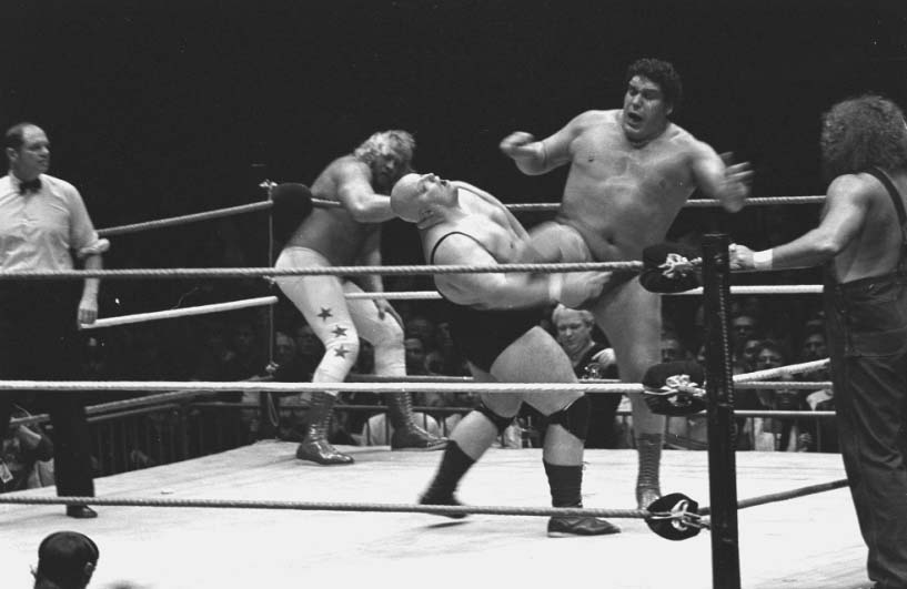 André (second from right) feuded with Big John Studd (left) in the build towards WrestleMania I, and later with King Kong Bundy (second from left). Photo Credit
