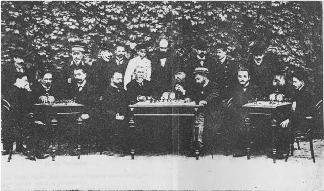 Picture was taken during the Kiev chess tournament in 1903. Bernstein is third from the left