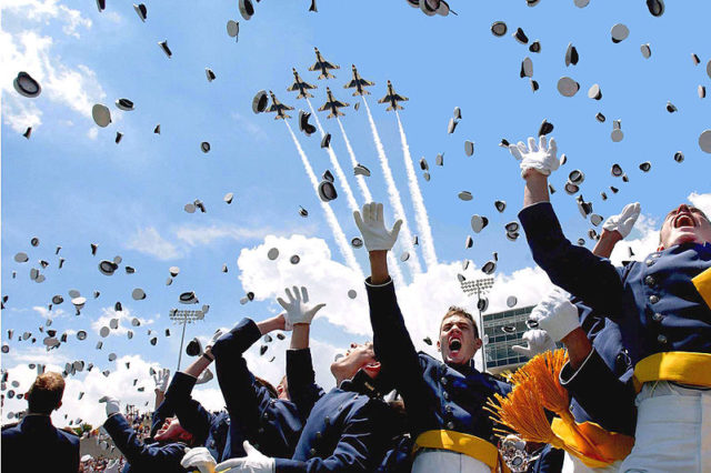 Air Force Academy cadets celebrate after graduation.