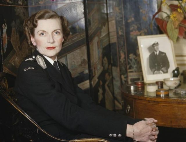 Women at War, 1939-1945, Nursing: Close-up of Lady Mountbatten, wearing the uniform of the St John’s Ambulance Brigade, sitting next to a small round table in the drawing-room of her house in Belgrave Square, London.