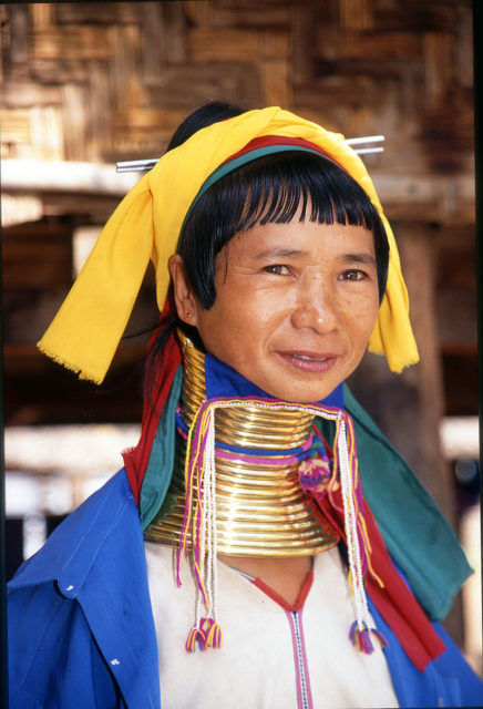 Burmese woman wearing a neck ring. Photo Credit