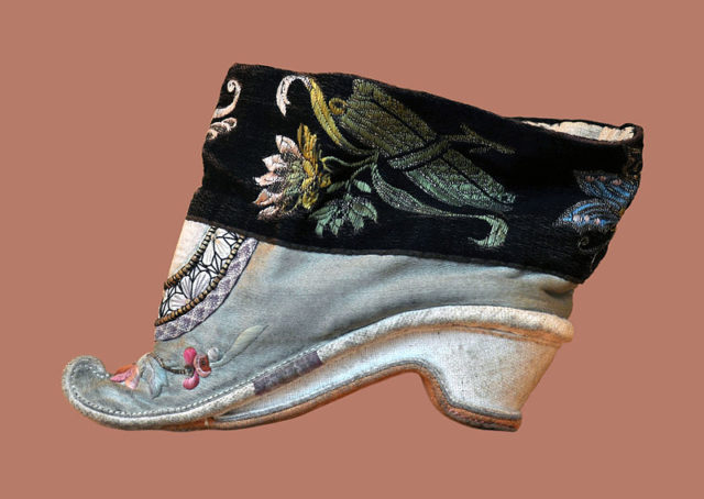 A lotus shoe for bound feet. The ideal length for a bound foot was 3 Chinese inches (寸), which is around 4 inches (10 cm)