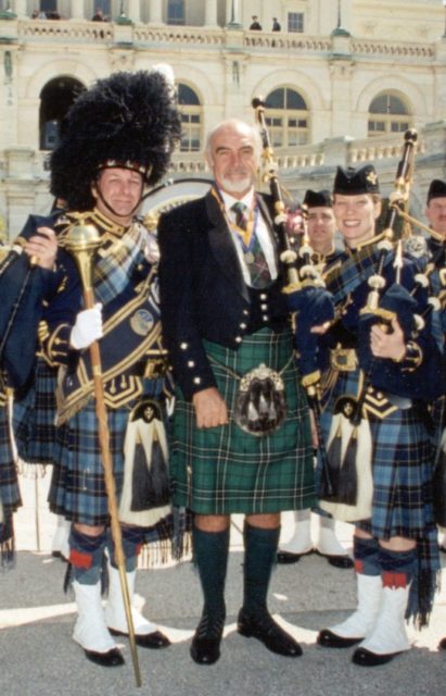 Connery in 2004 at a Tartan Day celebration in Washington D.C. with members of the USAF Reserve Pipes and Drums.