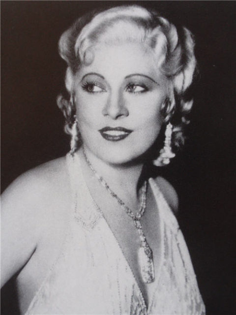 A photo of Mae West taken by L.A. Times as part of a news story. “I generally avoid temptation unless I can’t resist it.” was one of her famous double entendres that heated hundreds of heads and pants.