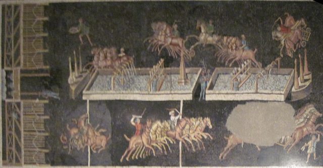 Mosaic from Lyon illustrating a chariot race with the four factions: Blue, Green, Red and White Photo Credit