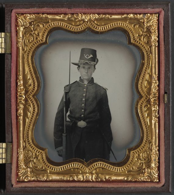 Unidentified young soldier in Union infantry uniform with Hardee hat and musket. . LOC