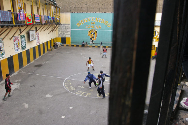 Prisoners in San Pedro playing football. Photo credit