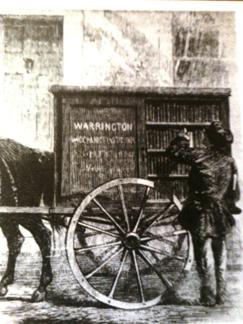 One of the very first photos showing book wagons: the Perambulating Library of 1859 in Warrington, England