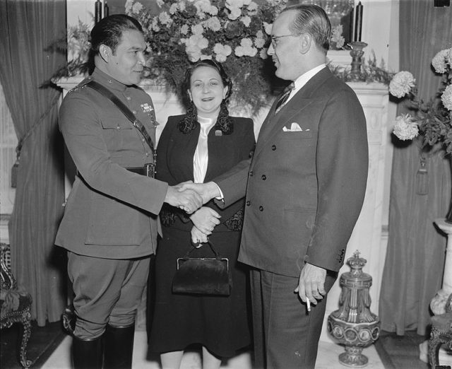 Batista (left) with his first wife Elisa Godinez-Gómez on a 1938 visit to Washington, D.C., greeting the Cuban ambassador, Dr. Pedro Fraga