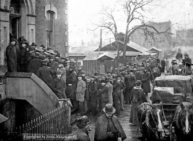Klondikers buying miner’s licenses at the Custom House in Victoria, BC, on February 12, 1898