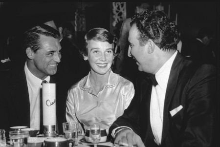 Grant with his third wife Betsy Drake and the saxophonist Dick Stabile (right) in 1955  Photo Credit
