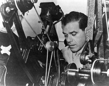 Major Frank Capra editing film during WWII.